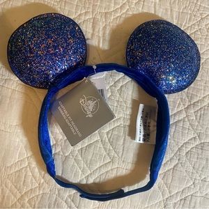 NWT Disney Parks Adjustable
Blue Glitter Minnie Ears
